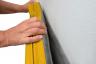Prallschutzmatten-Wandbefestigung-gelb - Prallschutzmatten für Wände sowohl für den Innen- als auch für den Außenbereich